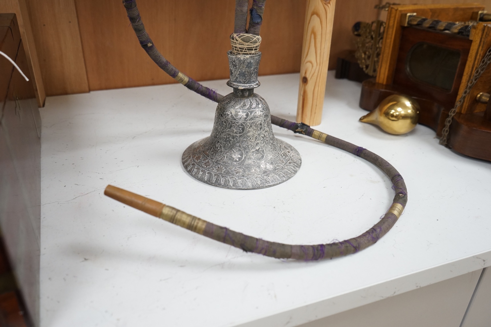 A modified silver plate, copper and porcelain hookah, 65cm